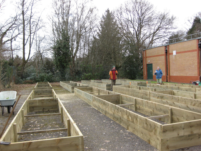 Empty raised beds waiting to be filled with soil
